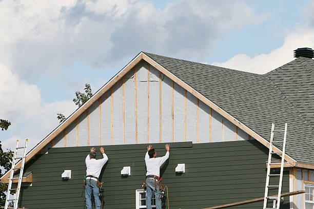 Professional Siding Installation technician working in Louisville, GA